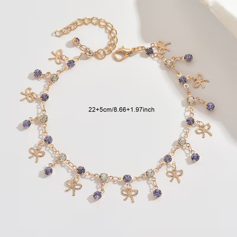 Cheville Bohème Dorée – Nœud Bleu et Pompon Franges